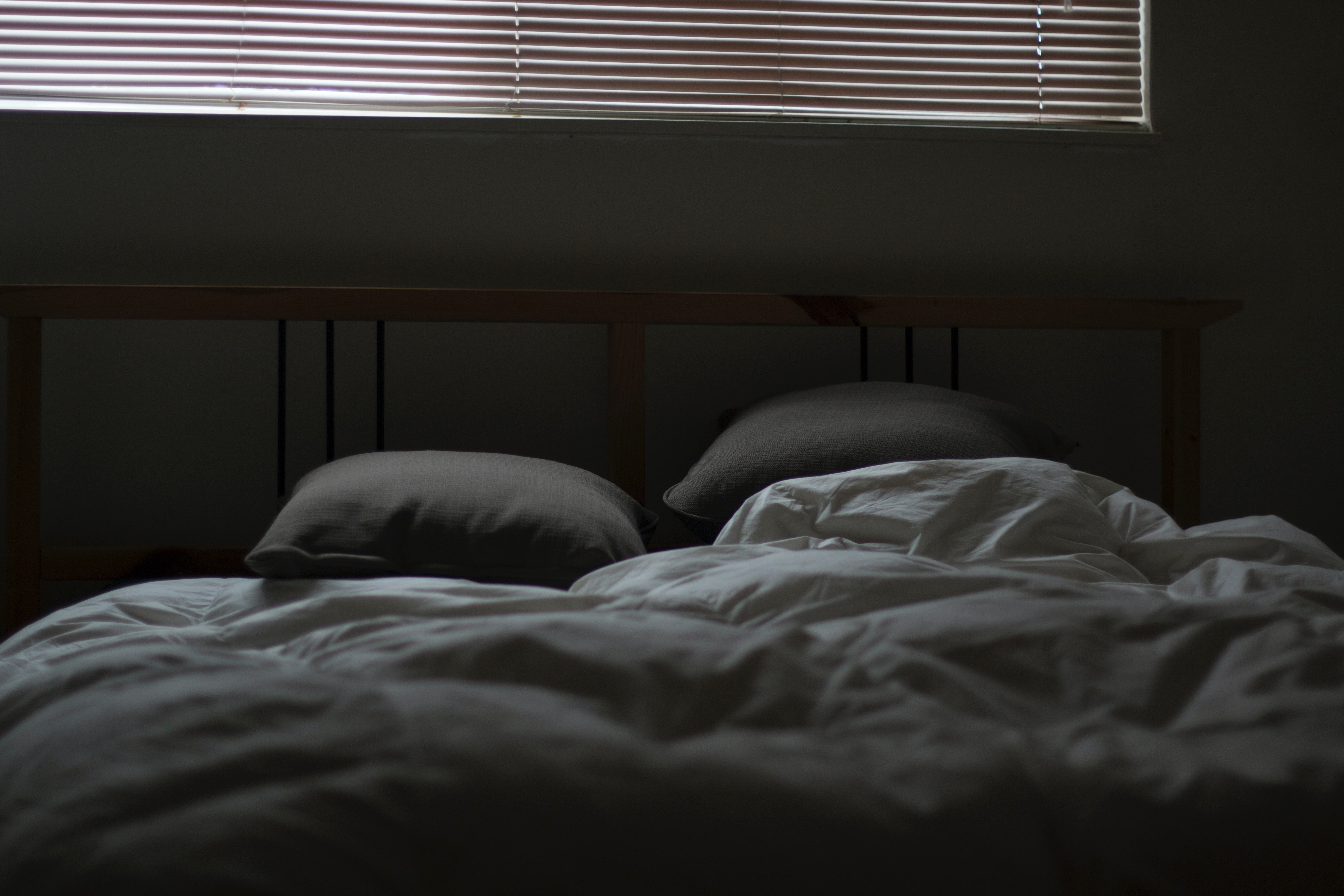 Empty white and grey bed set