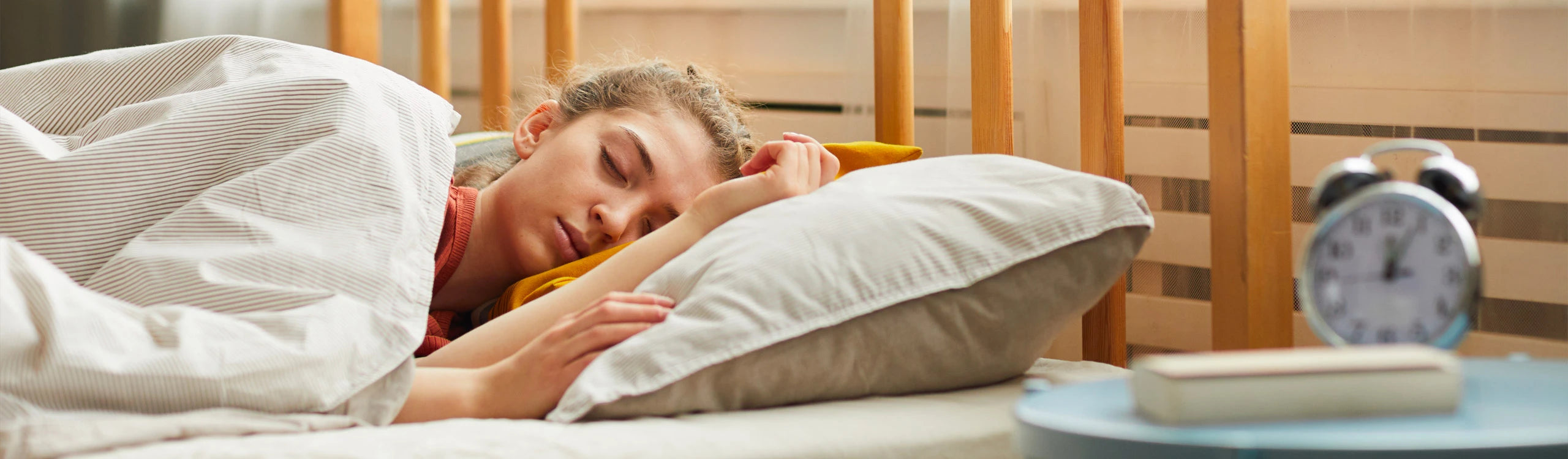 woman in bed with high sleeping temperature